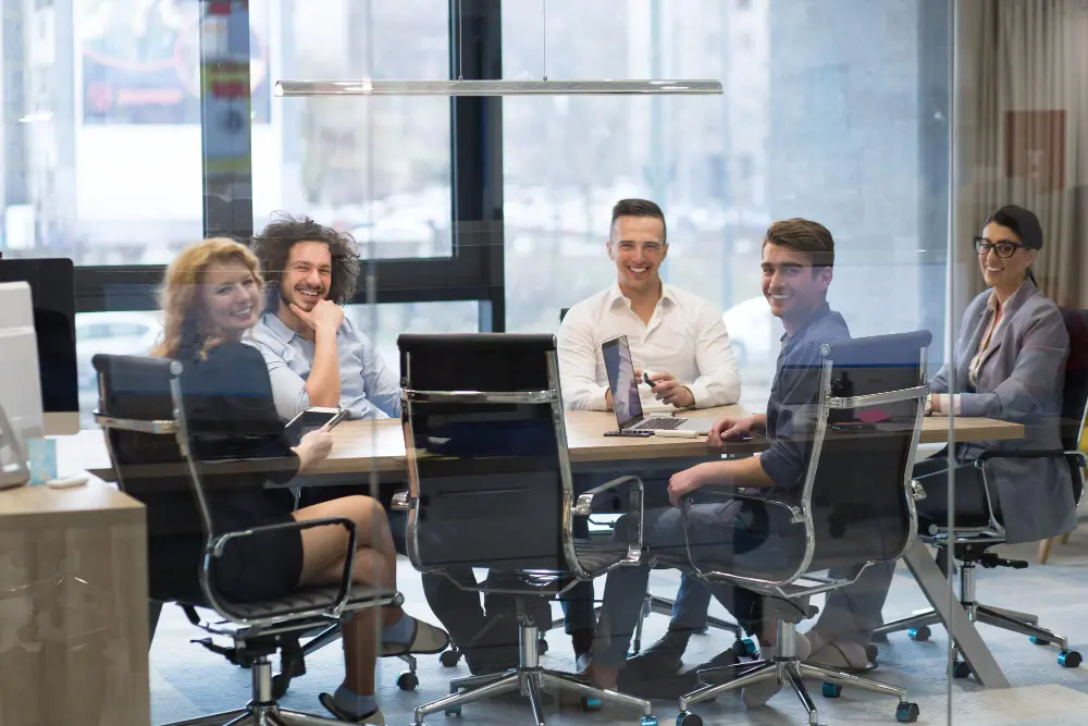 Professionals working in a modern Saudi Arabian corporate office