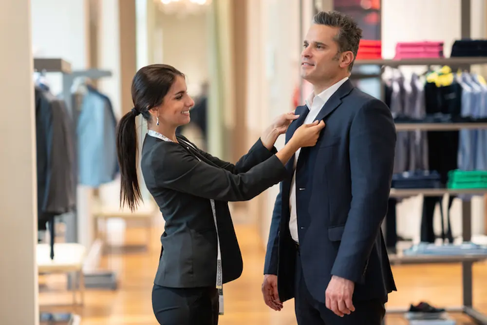 Bespoke tailoring vs luxury designer brands comparison in Dubai