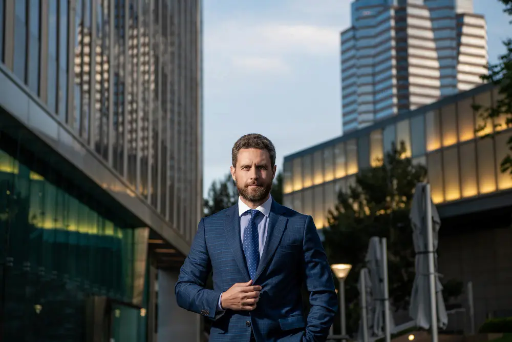 Professional wearing a bespoke suit that demonstrates the long-term value of quality tailoring.